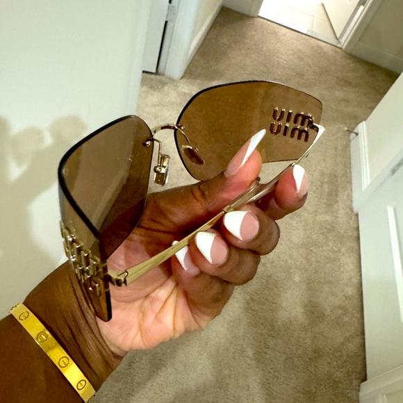 Brand new sunglasses in box with receipt miu miu - Picture 1 of 5